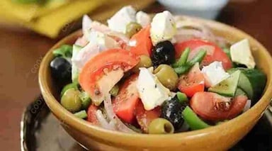 Tasty Greek Salad cooked by COOX chefs cooks during occasions parties events at home