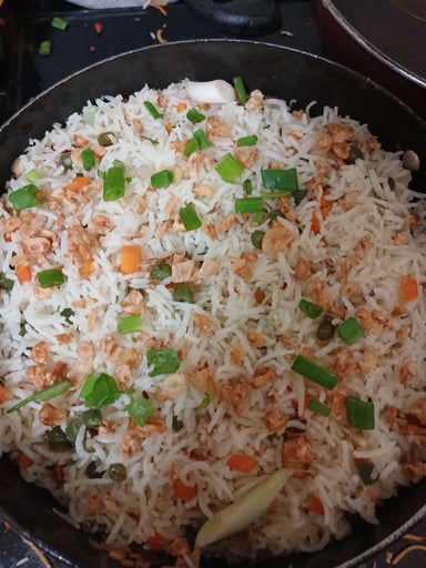 Tasty Burnt Garlic Rice cooked by COOX chefs cooks during occasions parties events at home