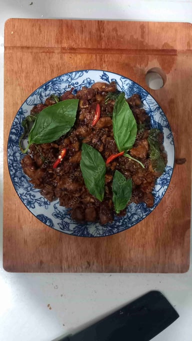 Tasty Thai Basil Chicken cooked by COOX chefs cooks during occasions parties events at home