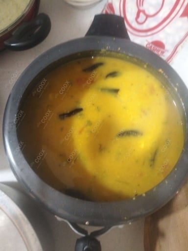 Tasty Arhar Dal cooked by COOX chefs cooks during occasions parties events at home