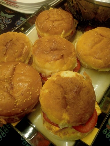 Tasty Paneer Tikka Burger cooked by COOX chefs cooks during occasions parties events at home