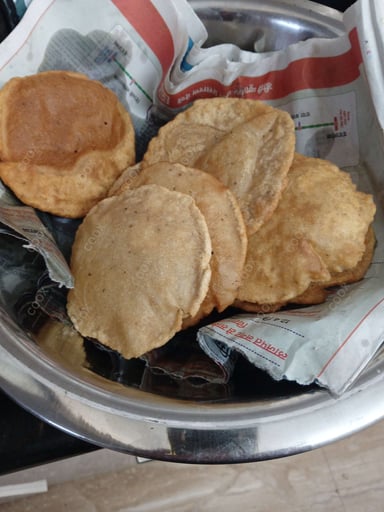 Tasty Poori Bhaji cooked by COOX chefs cooks during occasions parties events at home