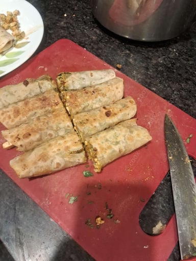 Tasty Veg Burritos cooked by COOX chefs cooks during occasions parties events at home