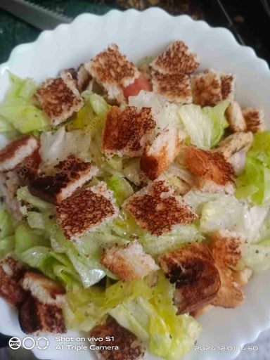 Tasty Chicken Caesar Salad cooked by COOX chefs cooks during occasions parties events at home