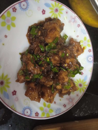 Tasty Chicken Manchurian (Dry) cooked by COOX chefs cooks during occasions parties events at home