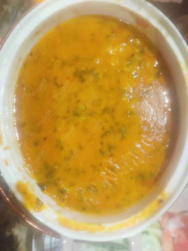 Tasty Palak Dal cooked by COOX chefs cooks during occasions parties events at home