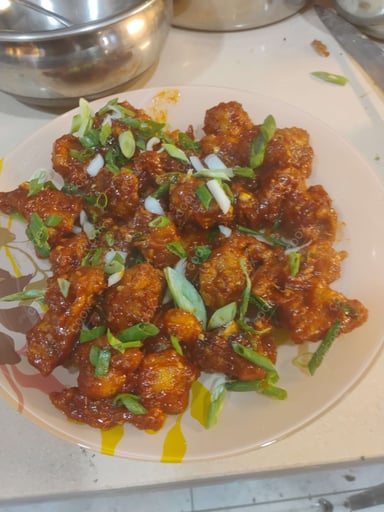 Tasty Gobi Manchurian cooked by COOX chefs cooks during occasions parties events at home