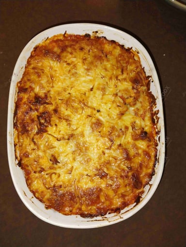 Tasty Chicken Lasagna cooked by COOX chefs cooks during occasions parties events at home