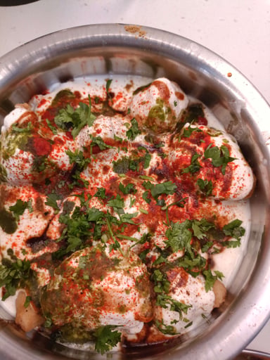 Tasty Dahi Vada cooked by COOX chefs cooks during occasions parties events at home