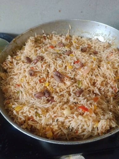 Tasty Mexican Rice cooked by COOX chefs cooks during occasions parties events at home