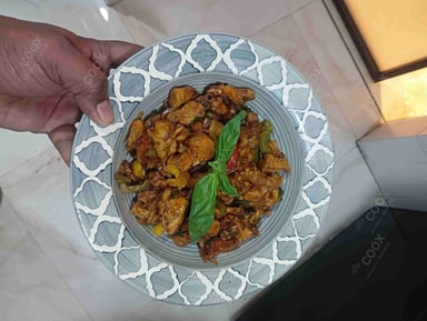 Tasty Thai Basil Chicken cooked by COOX chefs cooks during occasions parties events at home