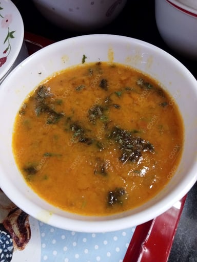 Tasty Masoor Dal  cooked by COOX chefs cooks during occasions parties events at home