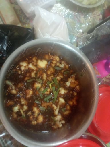 Tasty Gobi Manchurian cooked by COOX chefs cooks during occasions parties events at home