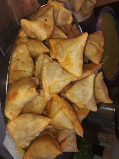 Tasty Keema Samosas cooked by COOX chefs cooks during occasions parties events at home