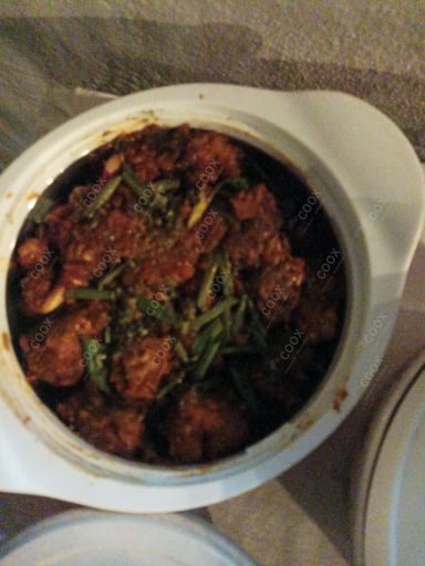 Tasty Chicken Manchurian (Dry) cooked by COOX chefs cooks during occasions parties events at home