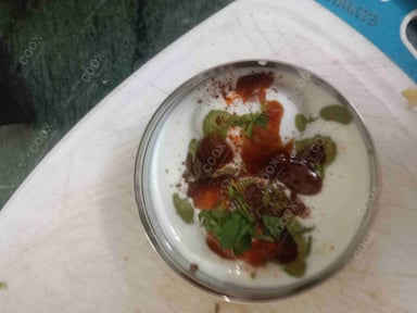 Tasty Dahi Vada cooked by COOX chefs cooks during occasions parties events at home