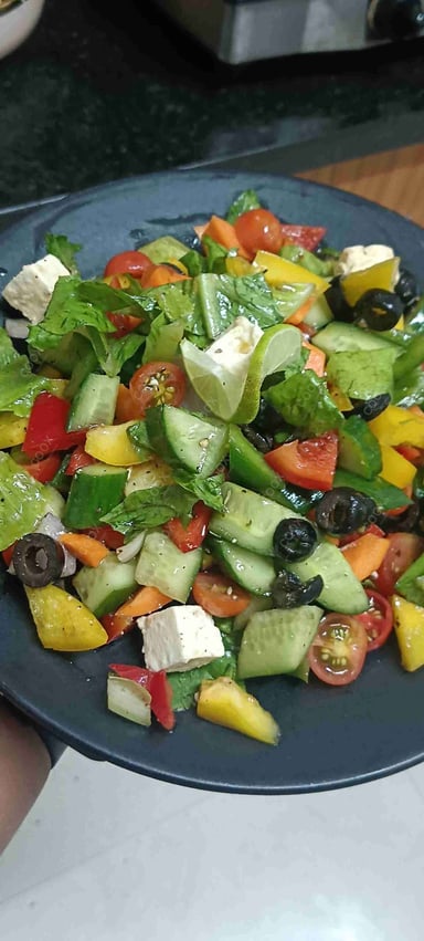 Tasty Greek Salad cooked by COOX chefs cooks during occasions parties events at home