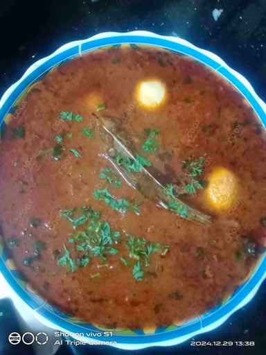 Tasty Egg Curry cooked by COOX chefs cooks during occasions parties events at home