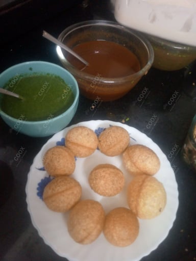 Tasty Gol Gappe (Pani Puri) cooked by COOX chefs cooks during occasions parties events at home