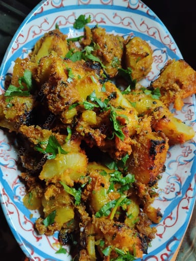 Tasty Tandoori Shakarkandi cooked by COOX chefs cooks during occasions parties events at home