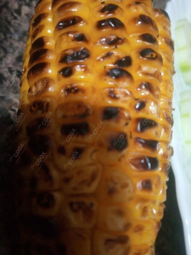 Tasty Grilled Corn cooked by COOX chefs cooks during occasions parties events at home