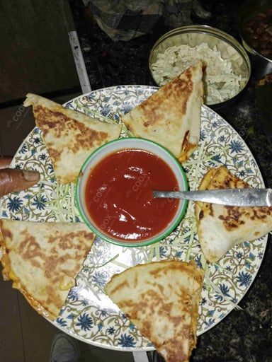 Tasty Chicken Quesadillas cooked by COOX chefs cooks during occasions parties events at home