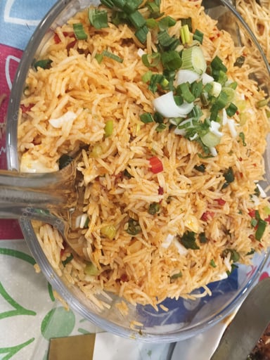 Tasty Schezwan Fried Rice cooked by COOX chefs cooks during occasions parties events at home