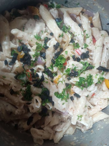 Tasty Chicken Pasta in White Sauce cooked by COOX chefs cooks during occasions parties events at home