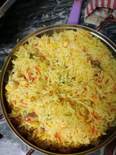 Tasty Mexican Rice cooked by COOX chefs cooks during occasions parties events at home