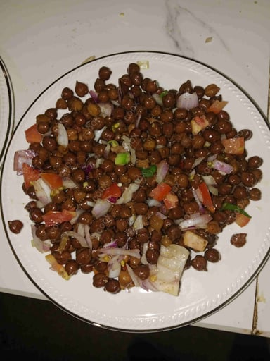 Tasty Kala Chana (Dry) cooked by COOX chefs cooks during occasions parties events at home