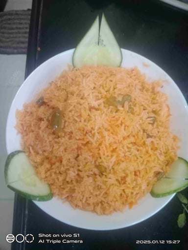 Tasty Mexican Rice cooked by COOX chefs cooks during occasions parties events at home