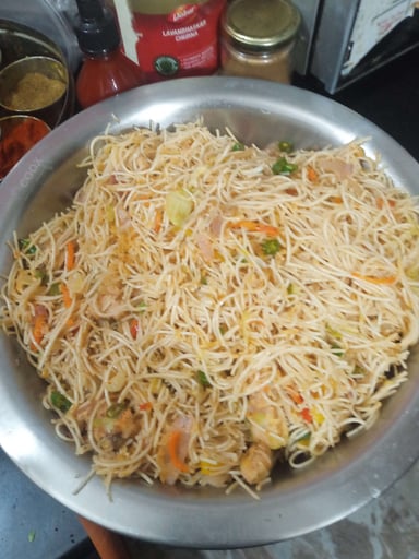 Tasty Chicken Hakka Noodles cooked by COOX chefs cooks during occasions parties events at home