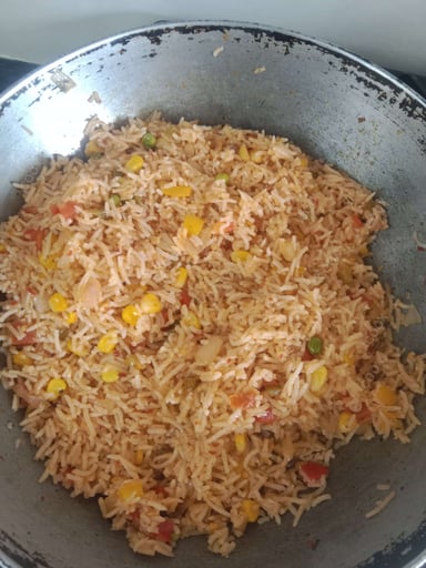 Tasty Mexican Rice cooked by COOX chefs cooks during occasions parties events at home