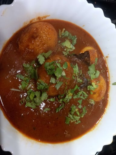 Tasty Egg Curry cooked by COOX chefs cooks during occasions parties events at home