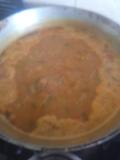 Tasty Vada Sambhar cooked by COOX chefs cooks during occasions parties events at home