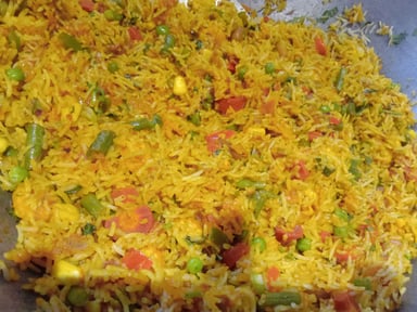 Tasty Mexican Rice cooked by COOX chefs cooks during occasions parties events at home