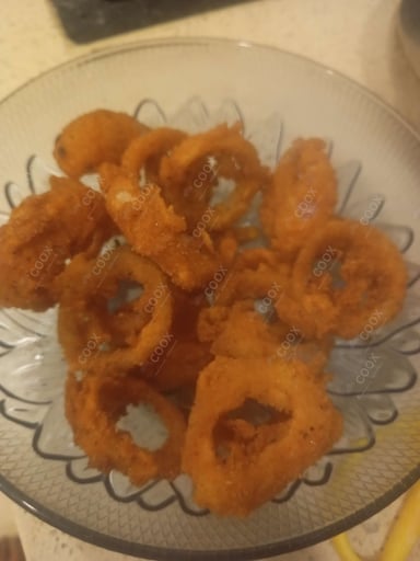 Tasty Onion Rings cooked by COOX chefs cooks during occasions parties events at home