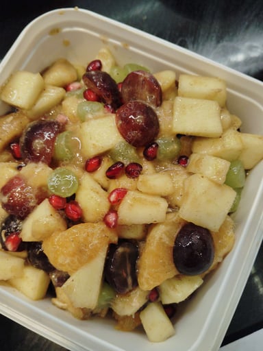 Tasty Fruit Chaat cooked by COOX chefs cooks during occasions parties events at home