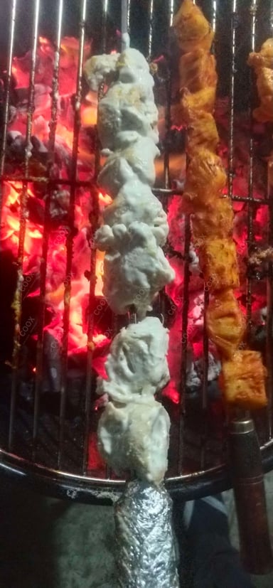 Delicious Tandoori Malai Chaap (Dry) prepared by COOX