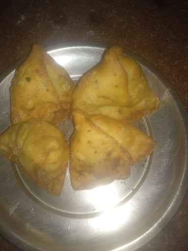 Delicious Mini Samosas prepared by COOX