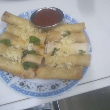 Delicious Veg Spring Rolls prepared by COOX