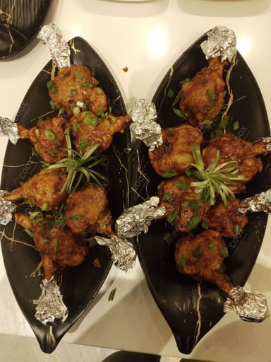 Delicious Chicken Lollipop prepared by COOX