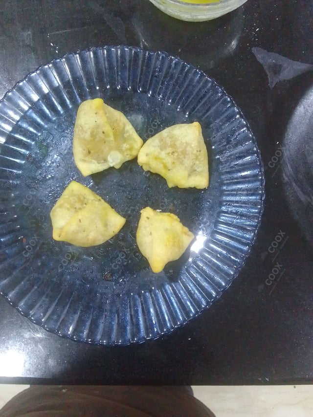 Delicious Mini Samosas prepared by COOX