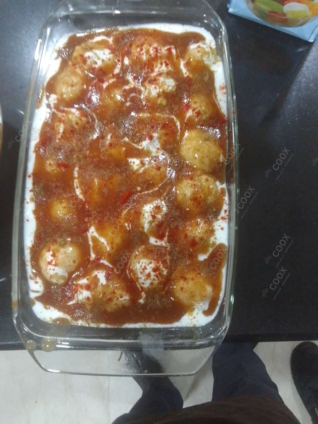 Delicious Dahi Bhalla prepared by COOX