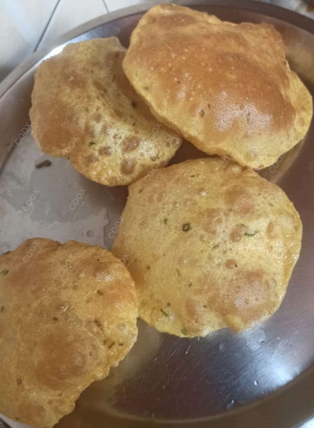 Delicious Poori & Bedmi prepared by COOX