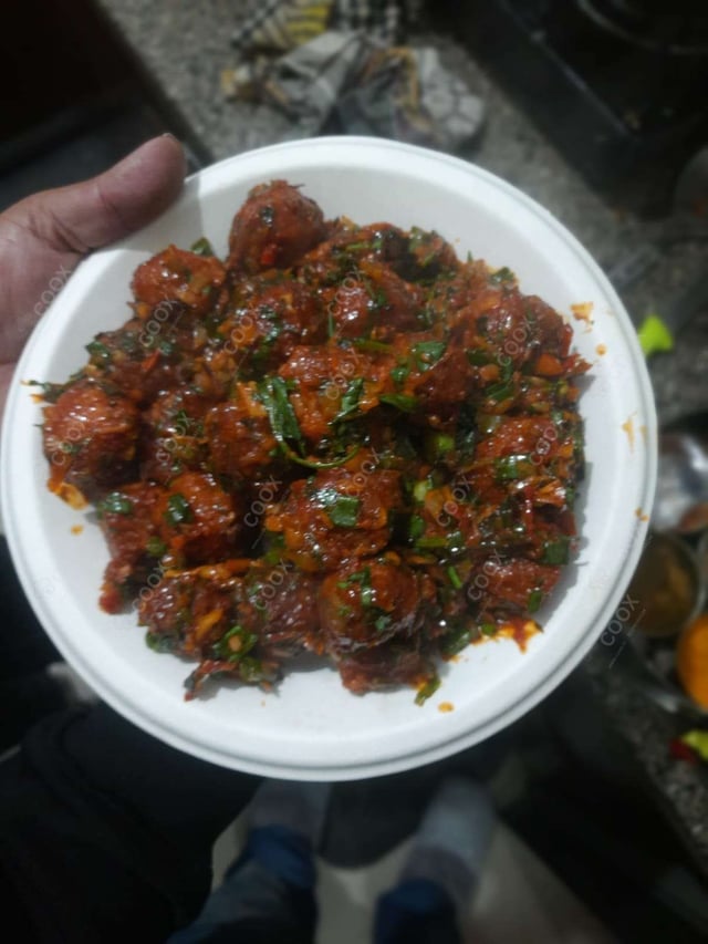 Delicious Veg Manchurian (Dry) prepared by COOX