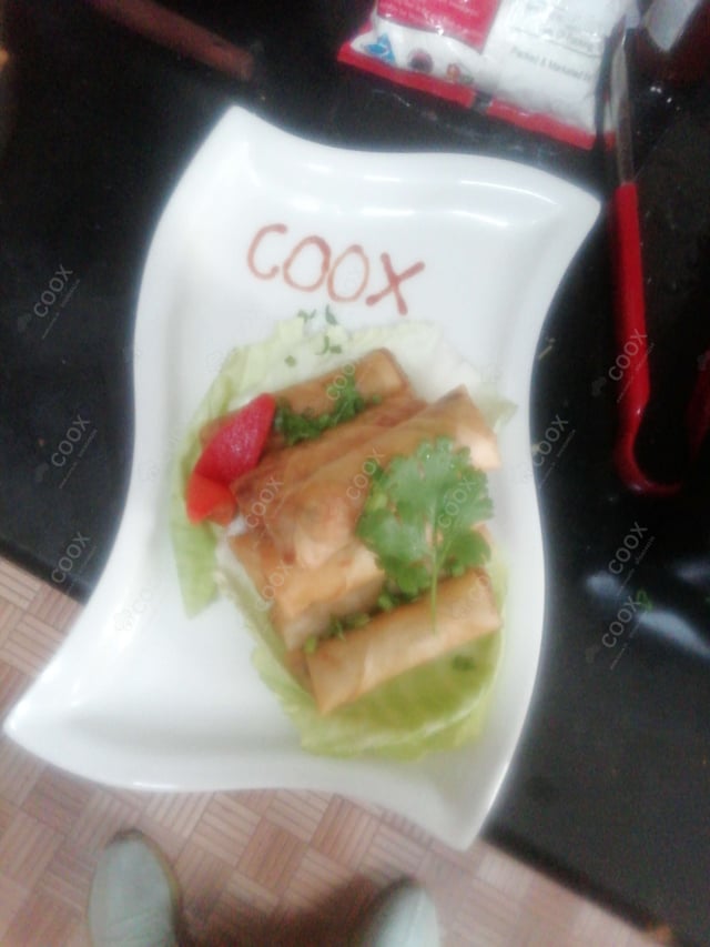 Delicious Veg Spring Rolls prepared by COOX