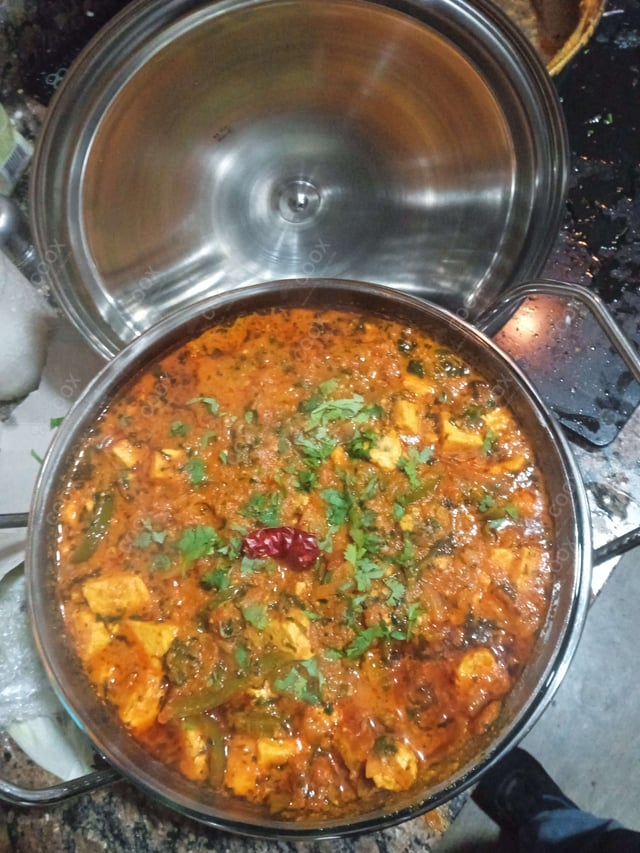 Delicious Kadhai Paneer prepared by COOX