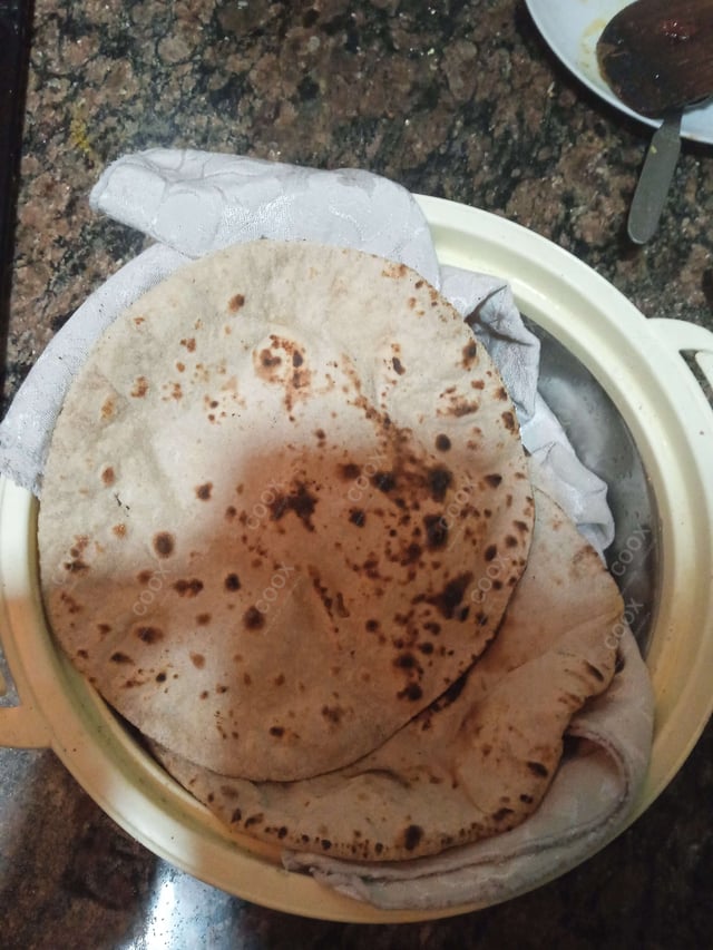 Delicious Makki ki Rotis prepared by COOX