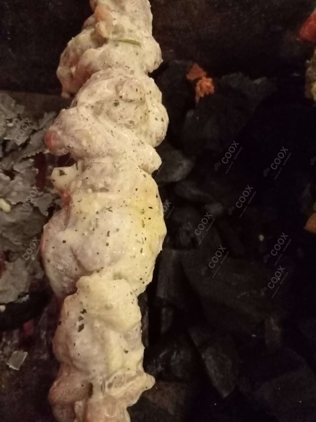 Delicious Murgh Malai Tikka prepared by COOX